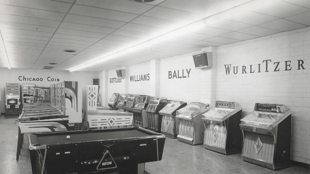 Chicago Coin Machine Company products in showroom with other coin-op brands